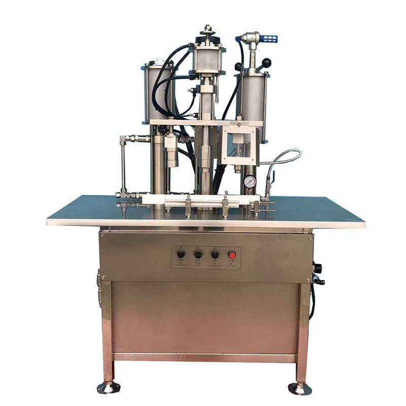 Small scale aerosol filling machine