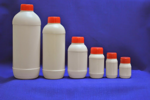 Pesticide Bottles Packed by Screw Capping Machine
