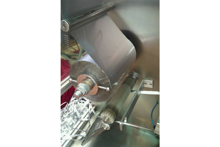 Aluminum foil installing roller and waste rewinding part