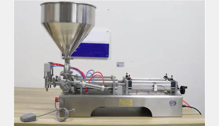 Semi-automatic tube filling machine