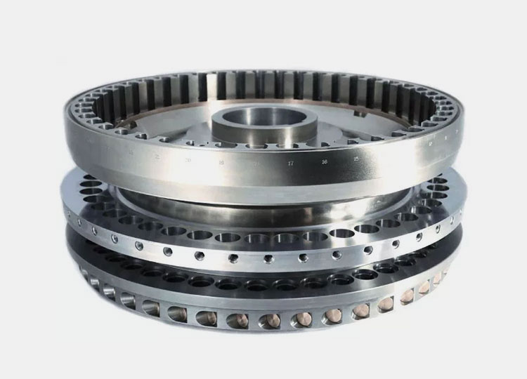 A high speed double punch rotary press turret with multiple stations