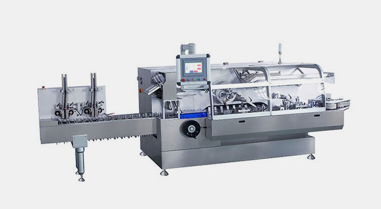 Continuous bottle cartoning machine