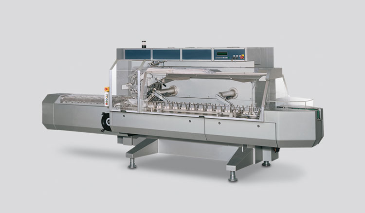 Continuous motion cartoning machine