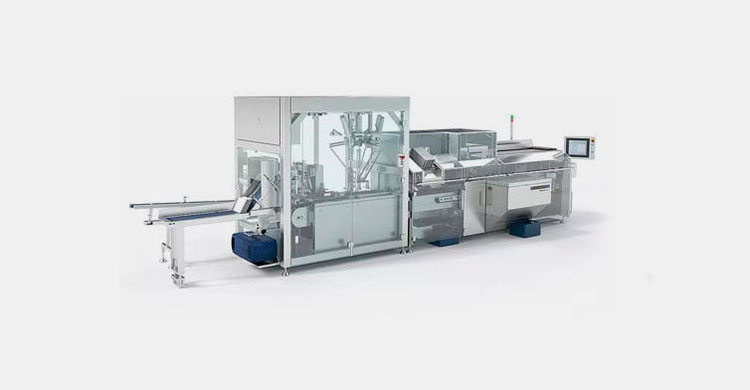 Continuous motion food cartoning machine