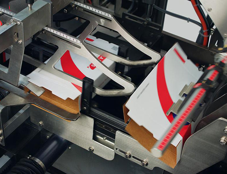 Positioning of cartons