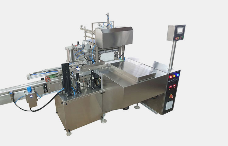 Semi-automated vial cartoning machine