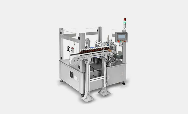 Vertical bottle cartoning machine
