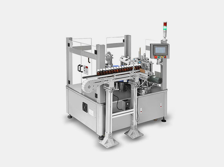 Vertical tube cartoning machine