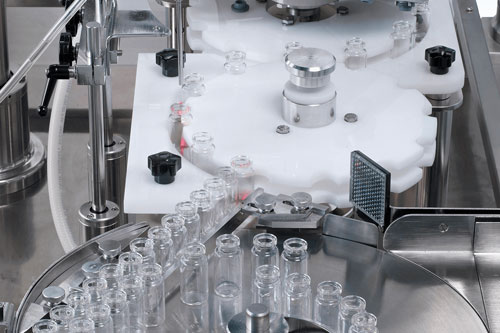 Vial feeding plate