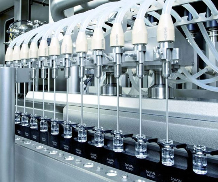 Vial filling and capping machine