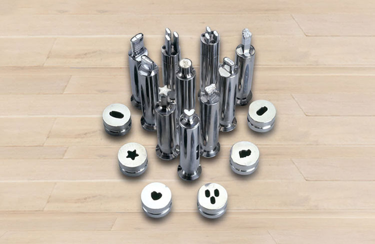 Different punches and dies used in tablet formation