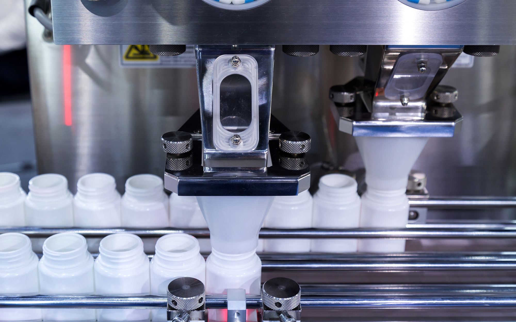 Adjusting machine with client bottles