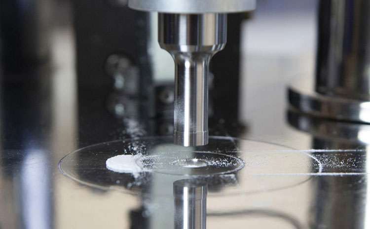 Physics of Powder Compression